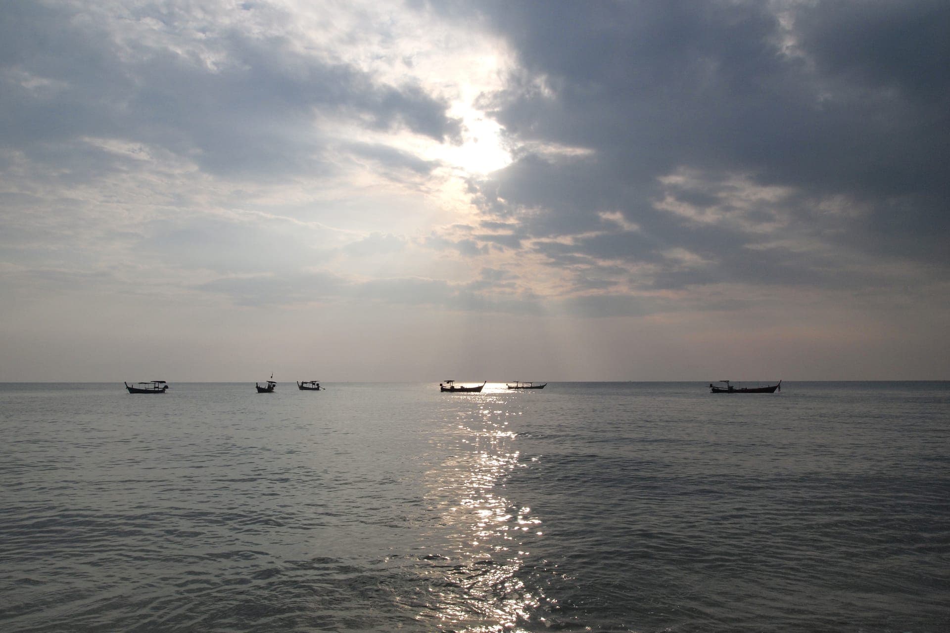 The Andaman Sea off Khao Lak, fishing boats at dusk